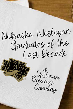 Napkin on a table that reads, "Nebraska Wesleyan Graduates of the Last Decade" at Upstream Brewery Company