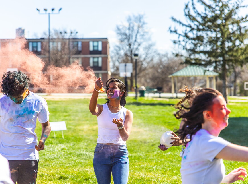 Students throwing color at each other for the HOLI Festival. 