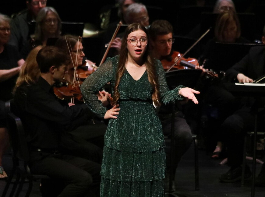 Shannon Engel performs a solo during a music production. 