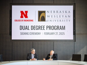 Lance C. Pérez, Fred Hunzeker Dean of Engineering at UNL and NWU President Darrin Good sign agreement. 