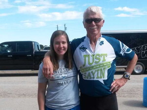 Carly Adams stands with fellow bike enthusiast Clayton Streich