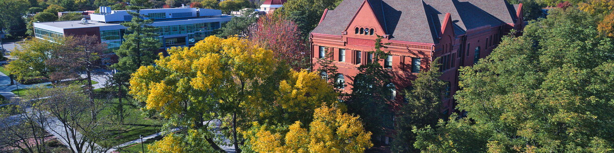 Aerial view of Old Main and Acklie buildings in the fall.