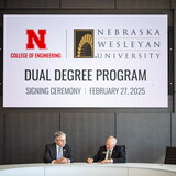 Lance C. Pérez, Fred Hunzeker Dean of Engineering at UNL and NWU President Darrin Good sign agreement. 