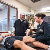 Jason Ensrud works with two NWU students.